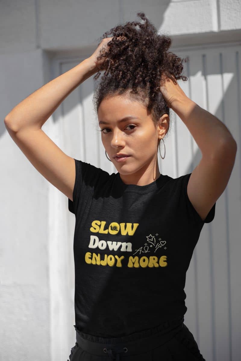 Relaxed fit graphic tee with a girl posing with her hair pulled up high
