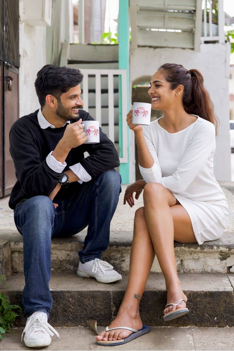 Retro Valentine mug with a couple sitting and chatting happily on the front steps