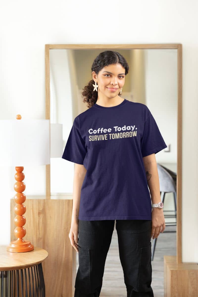 Retro coffee t-shirt design with a girl in a purple t-shirt with text, standing in a room with a mirror and decor.