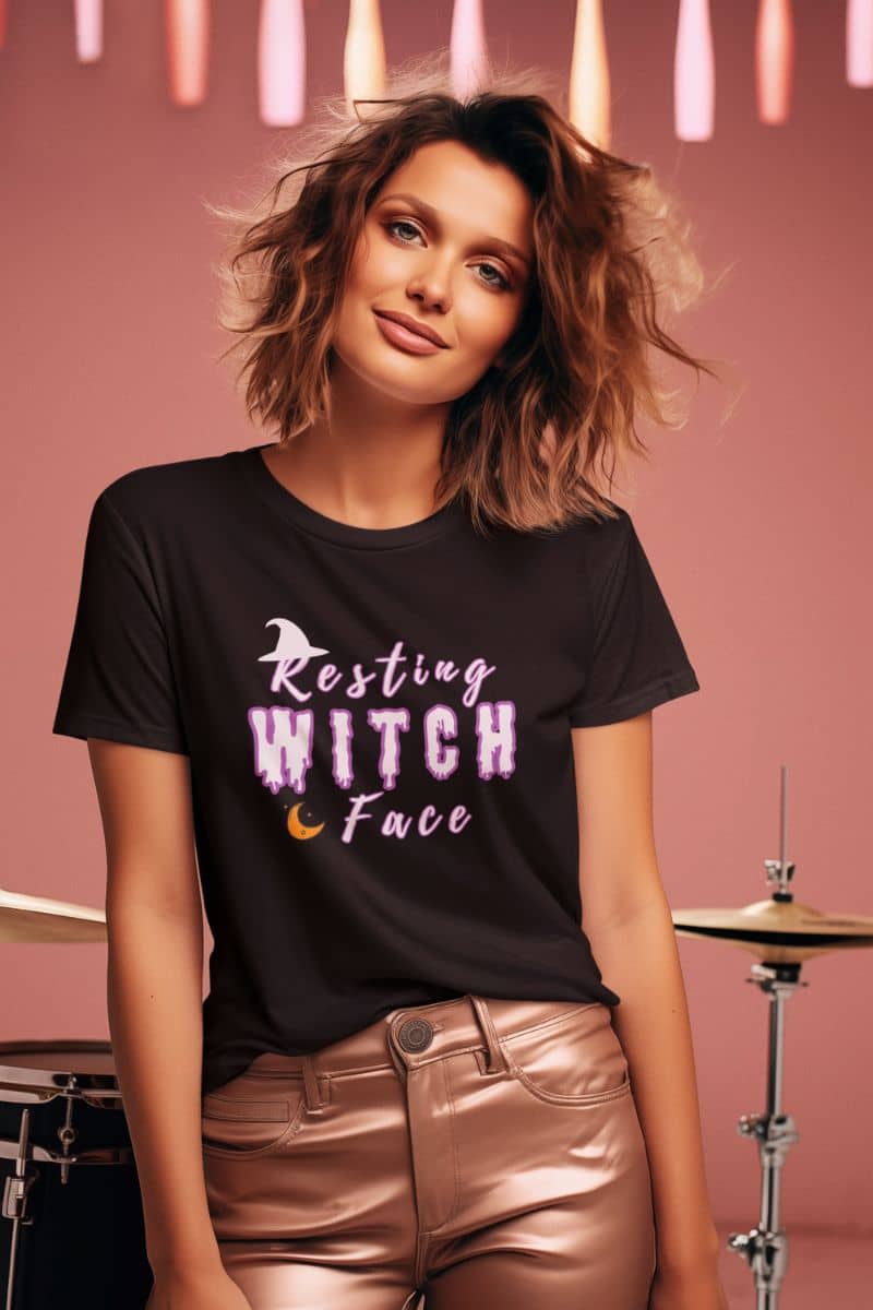 Sarcastic witch shirt with a woman wearing a black t-shirt with 'Resting Witch Face' text in a casual setting.