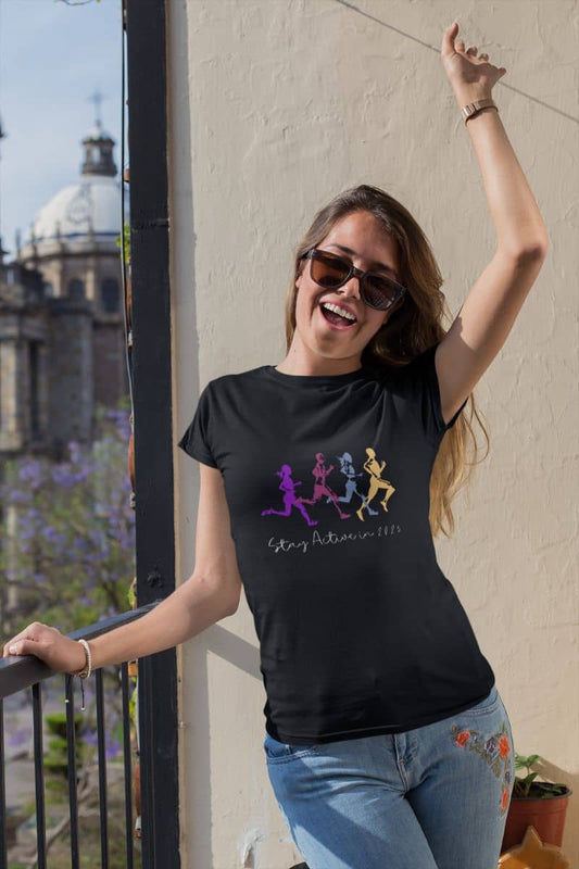 Stay Active in 2025 T-Shirt with a girl standing posing on the balcony and smiling brightly
