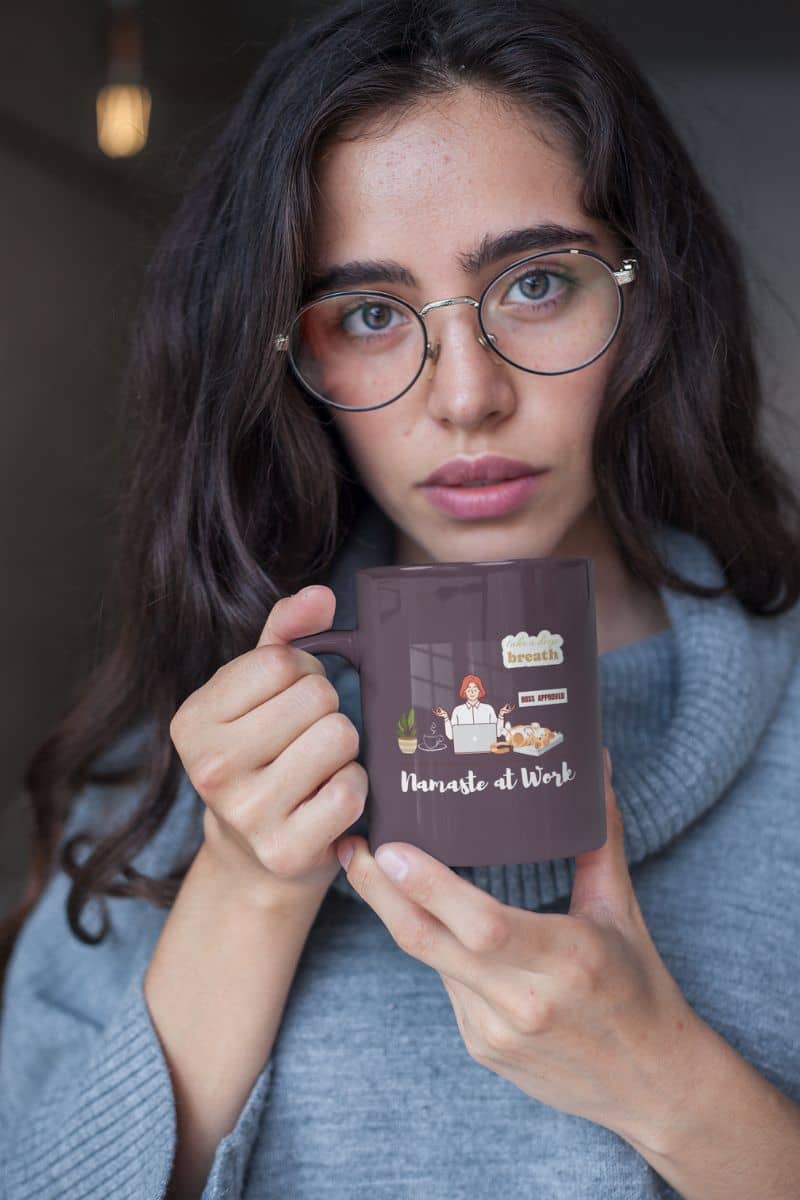 Stress relief coffee mug with a girl wearing glasses holding a cup in her hand