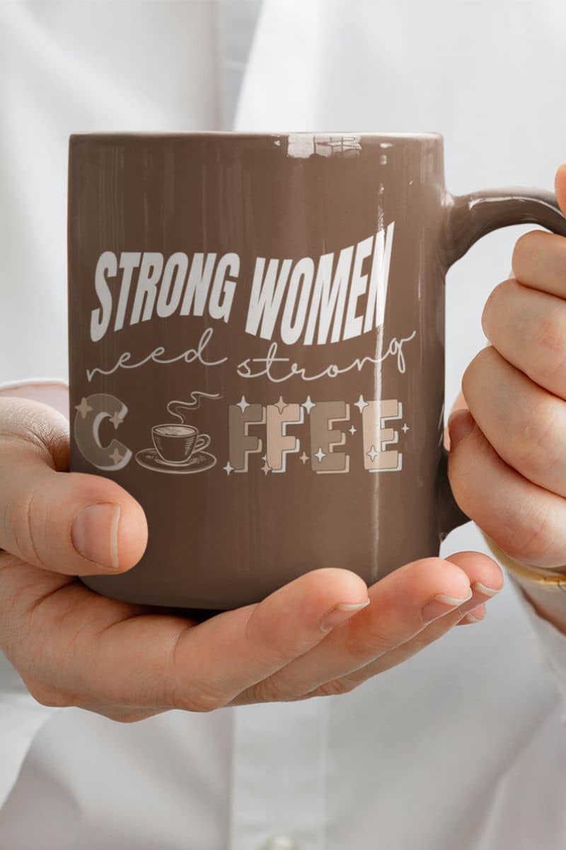 Strong women need strong coffee mug with a girl holding a cup of coffee in front of her chest