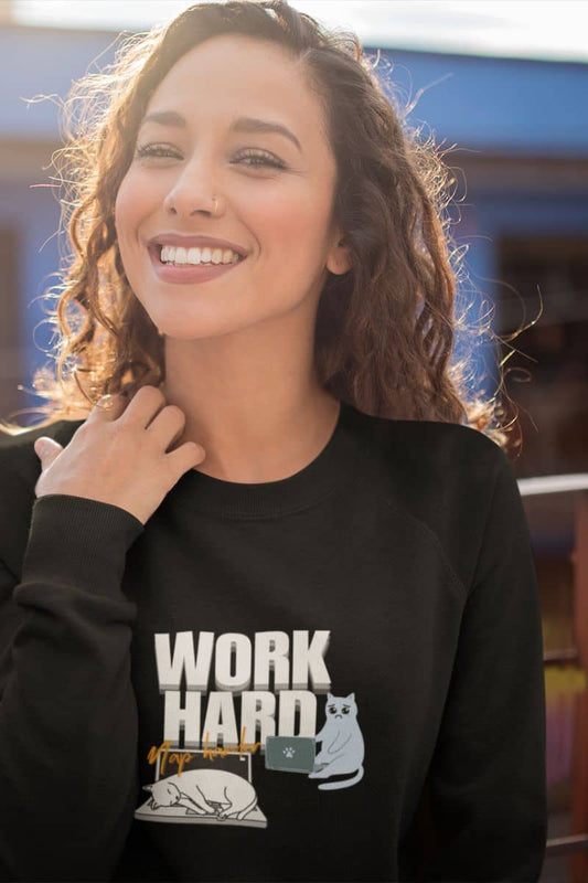 Work hard, nap harder sweatshirt with a girl smiling brightly while posing on the balcony