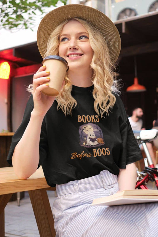 book lover shirt with a woman wearing a t-shirt featuring the text 'Books Before Boos'