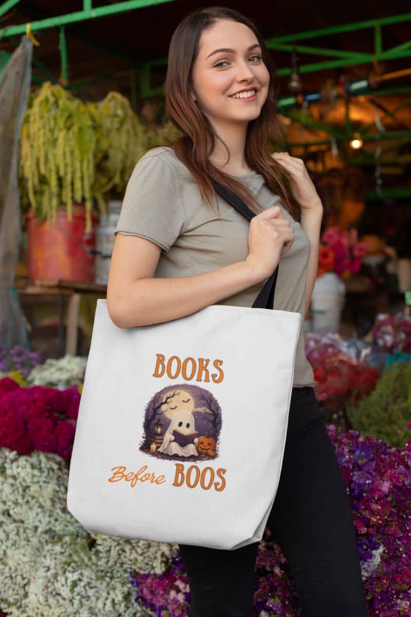 bookish tote bag with a woman carrying a tote bag featuring the text 'Books Before Boos'