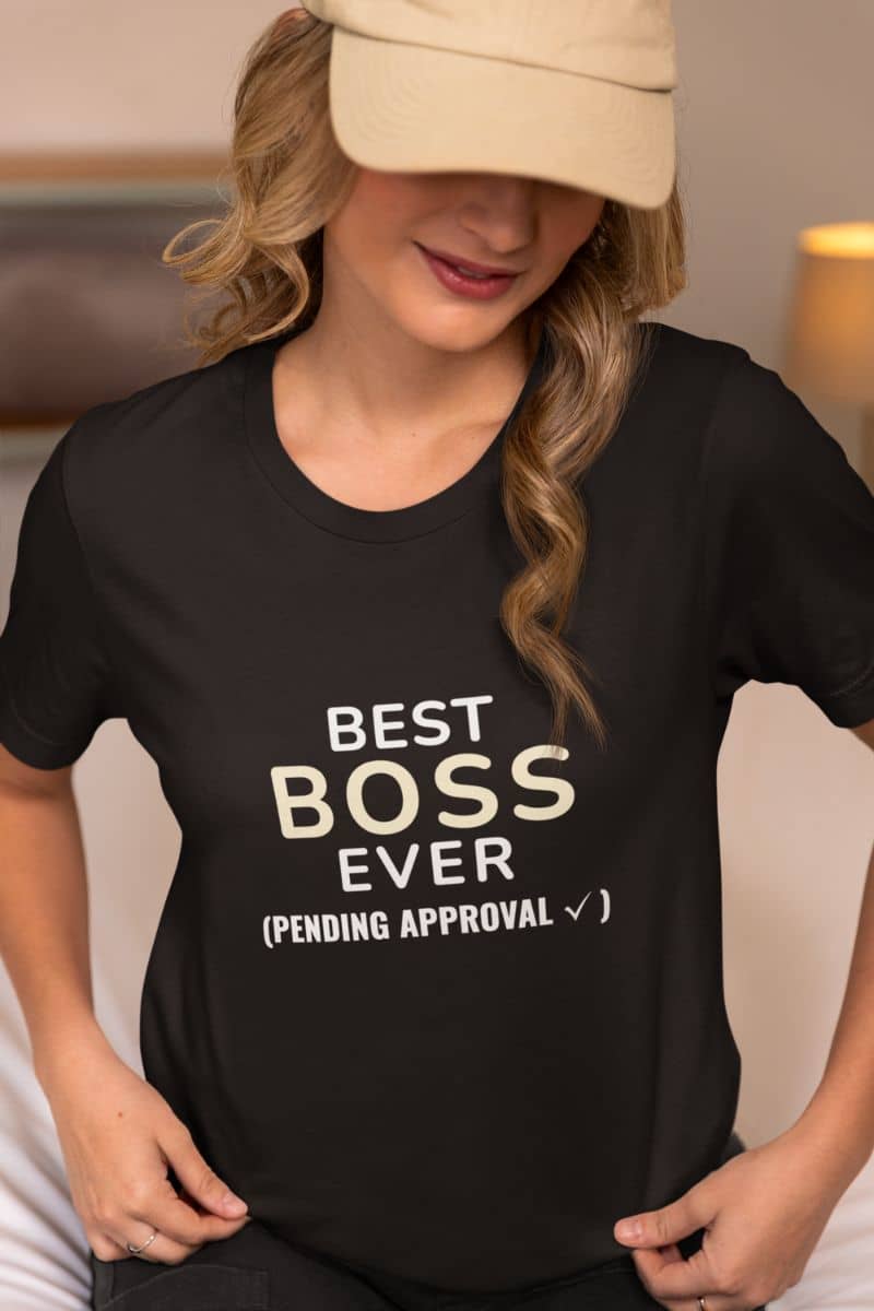 boss appreciation shirt with a person wearing a black t-shirt with text 'Best Boss Ever (pending approval)'.