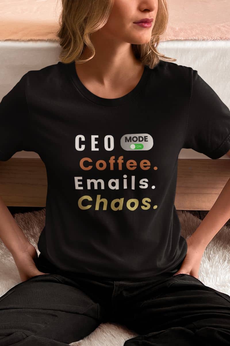 boss lady shirt with a woman in a black t-shirt with text 'CEO Mode: Coffee. Emails. Chaos.', sitting on the floor