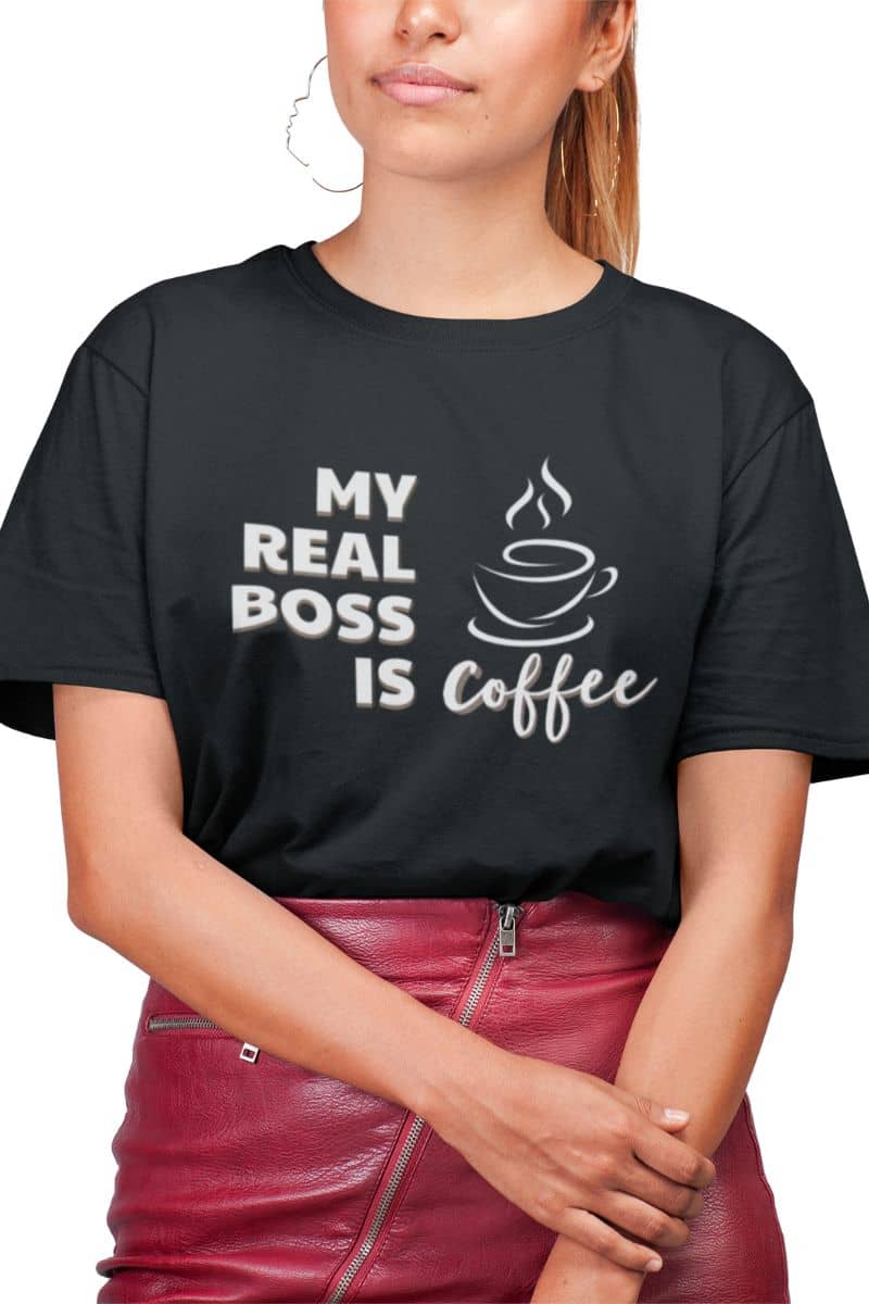 caffeine lover t-shirt with a person wearing a black t-shirt with 'My Real Boss is Coffee' text and graphic.