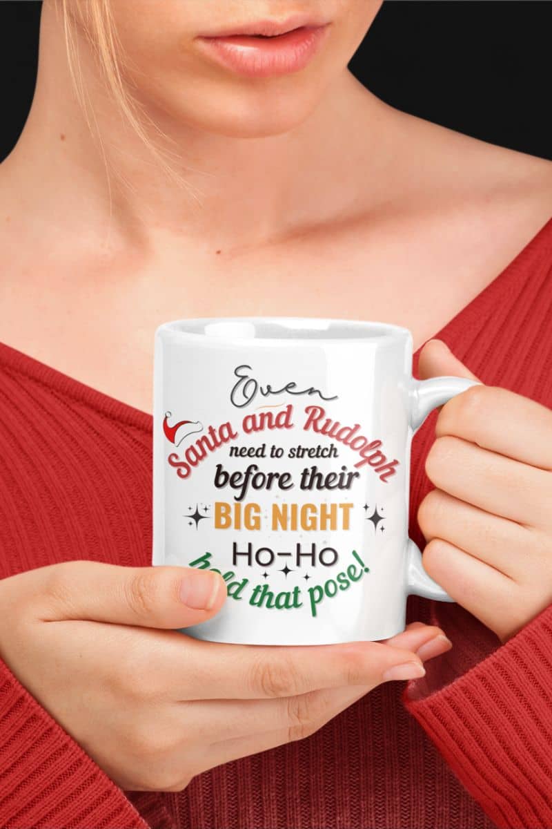 christmas coffee gift mug with a girl holding a white mug with text 'Event Santa & Rudolph Need to Stretch Before their Big Night. Ho-Ho-Hold That Pose!'