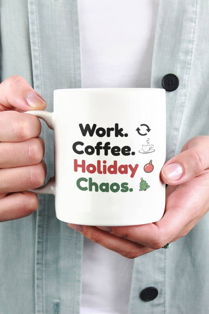 christmas mug for coworkers with a person holding a mug with 'Work. Coffee. Holiday Chaos.' text