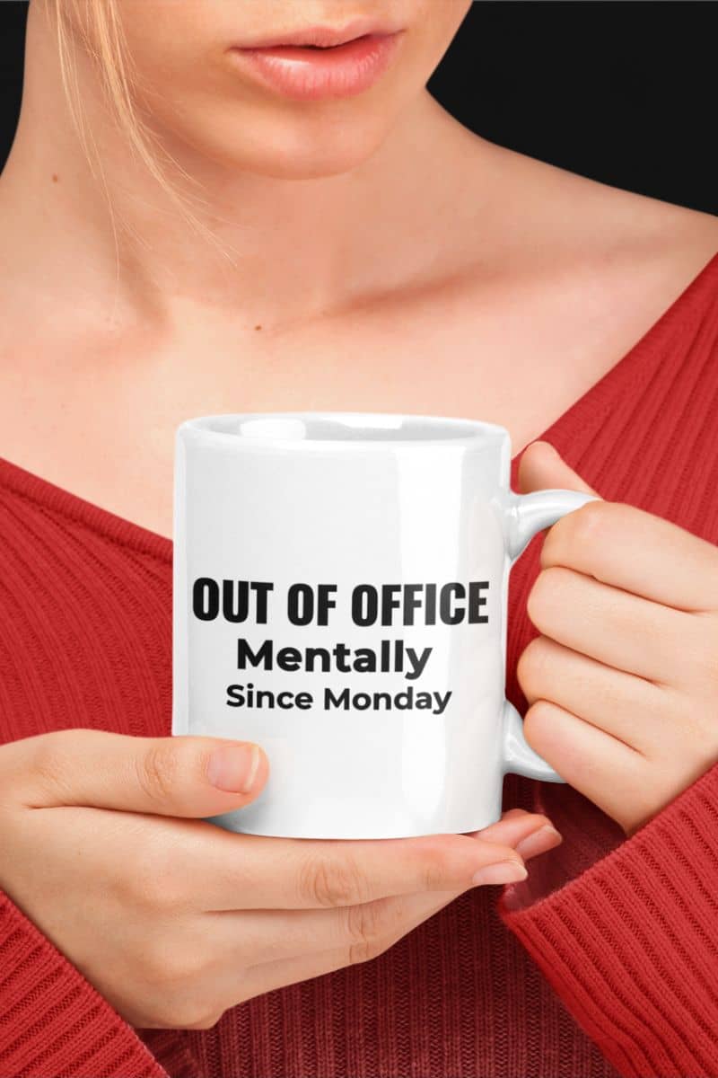 coworker mugs with a person holding a mug featuring the text 'Out of Office. Mentally Since Monday.'