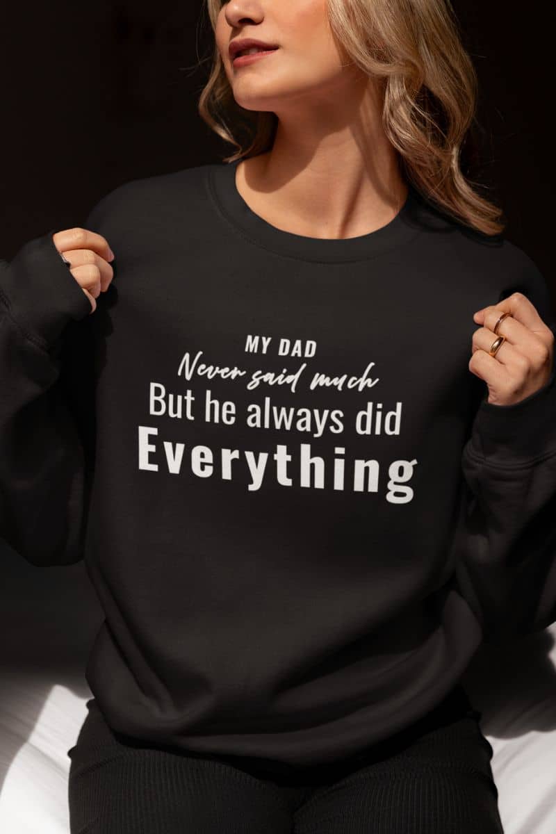 father sweatshirt with a person wearing a black sweatshirt with text 'My Dad Never Said Much, He Always Did Everything'