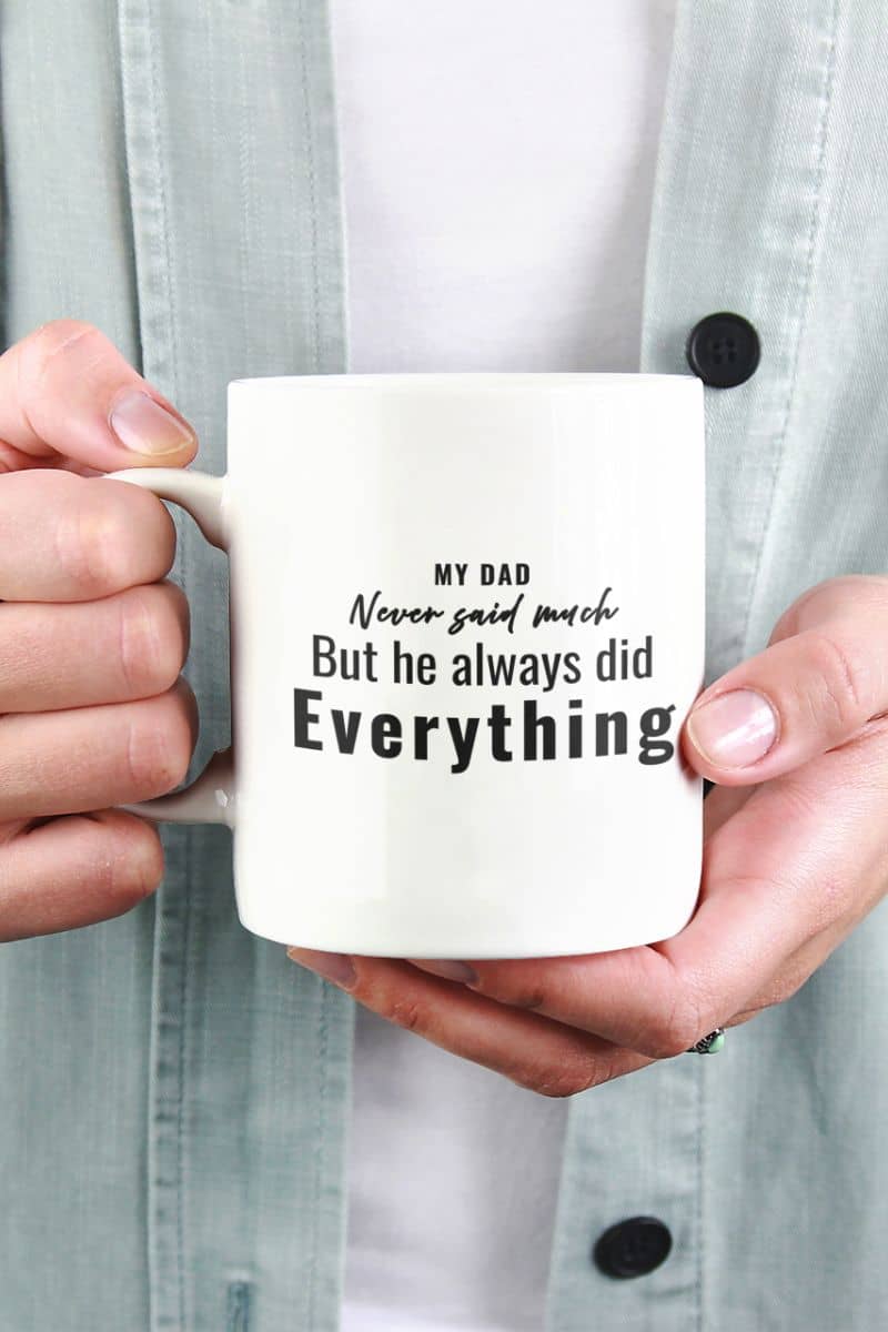 fathers day mug with a person holding a mug featuring the text 'My Dad Never Said Much, He Always Did Everything'