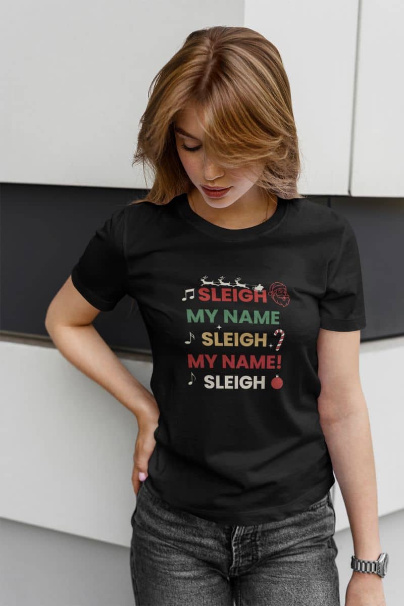 funny christmas shirt with a person wearing a black t-shirt with text 'Sleigh My Name, Sleigh My Name' and graphics.