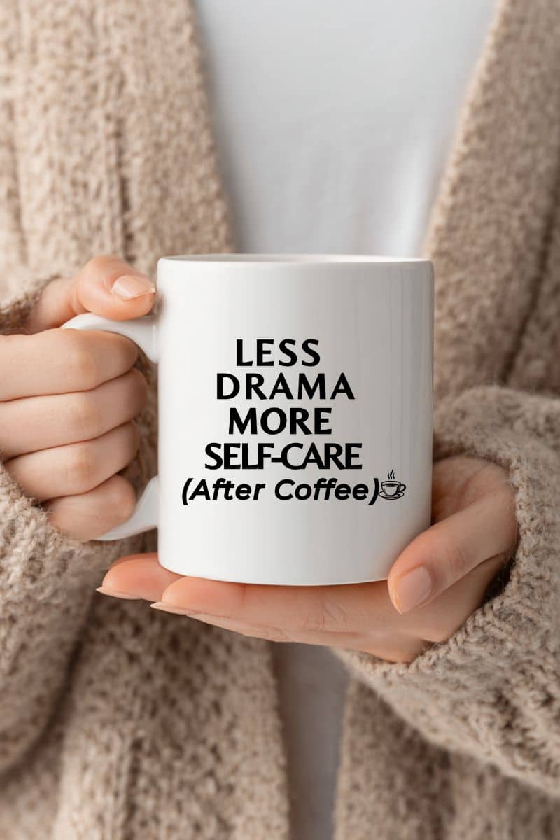funny coworker mug with a person holding a mug with 'Less Drama More Self-Care (After Coffee)' text