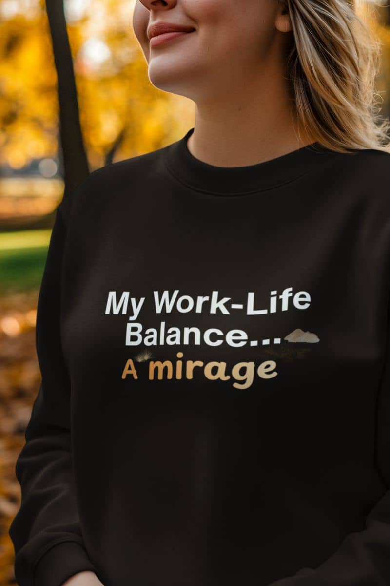 funny office anxiety sweater with a person wearing a black sweatshirt with text in an outdoor setting with blurred autumn leaves.