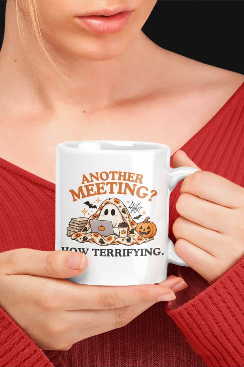 funny office mugs design featuring “Another Meeting? How Terrifying.” on a white ceramic mug held by a woman