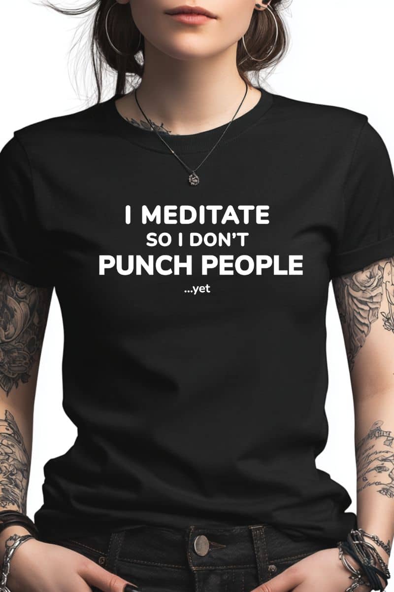 funny stress relief shirt with a person wearing a black t-shirt with text 'I Meditate So I Don’t Punch People...yet'