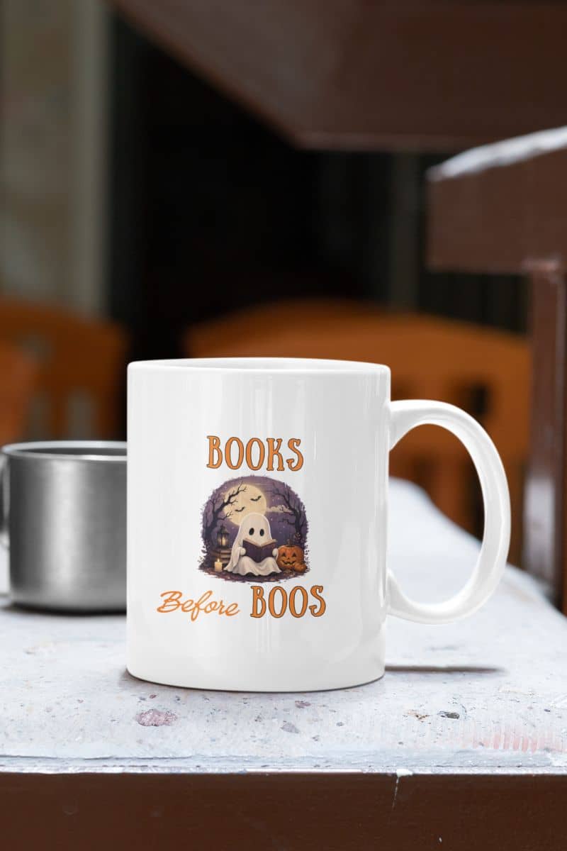 ghost mug with a mug featuring the text 'Books Before Boos'