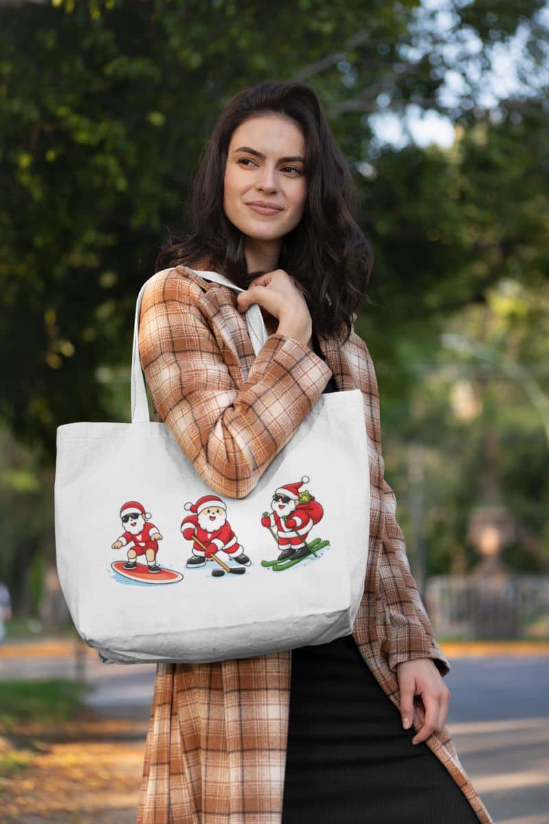 holiday sports tote with a woman holding a tote bag with Santa Claus designs outdoors
