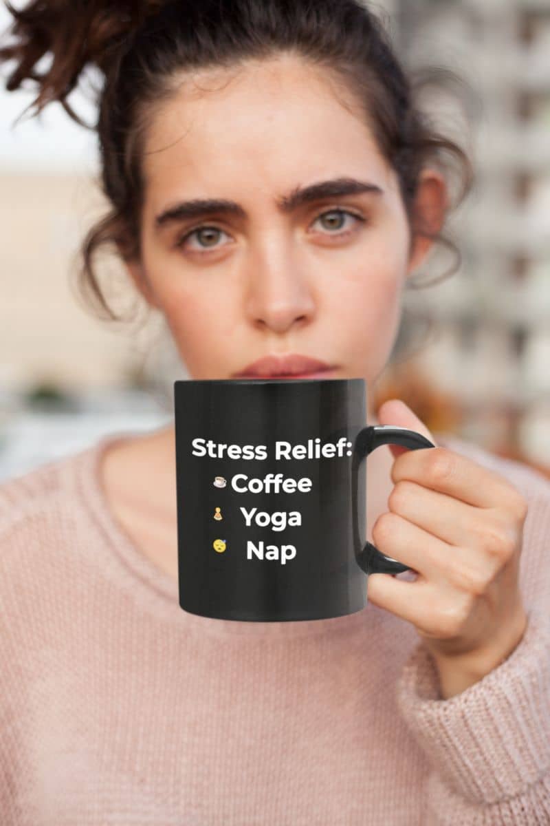 meditation tea mug with a woman holding a black mug with 'Stress Relief: Coffee, Yoga, Nap' text.