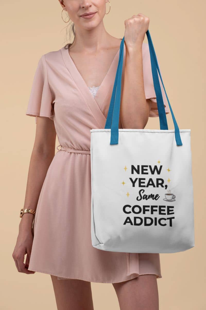 new year gift bag with a person holding a tote bag featuring the text 'New Year, Same Coffee Addict'