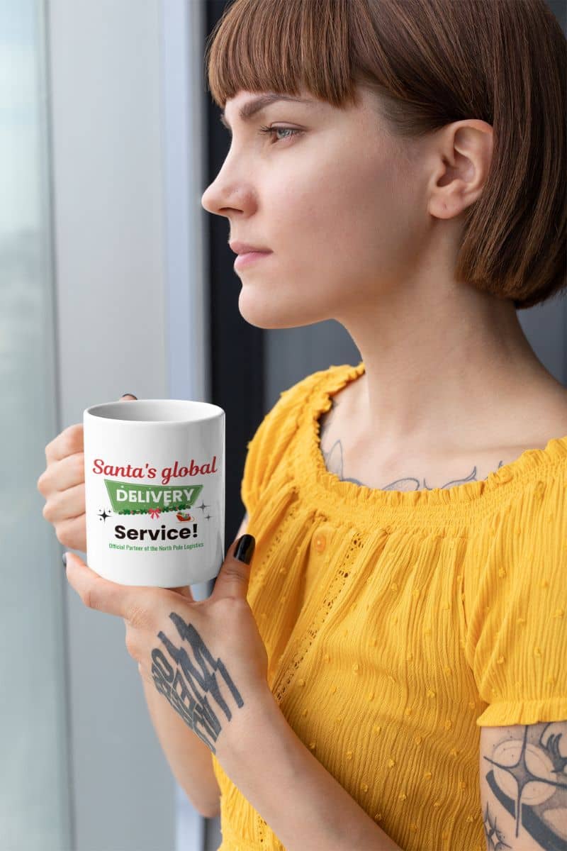 office holiday mug with a woman holding a mug with 'Santa's global delivery service' text