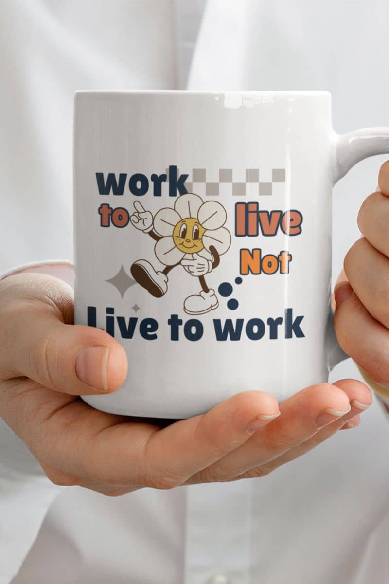 positive message mug with a person holding a mug with text 'Work to Live, Not Live to Work' and cartoon character design.