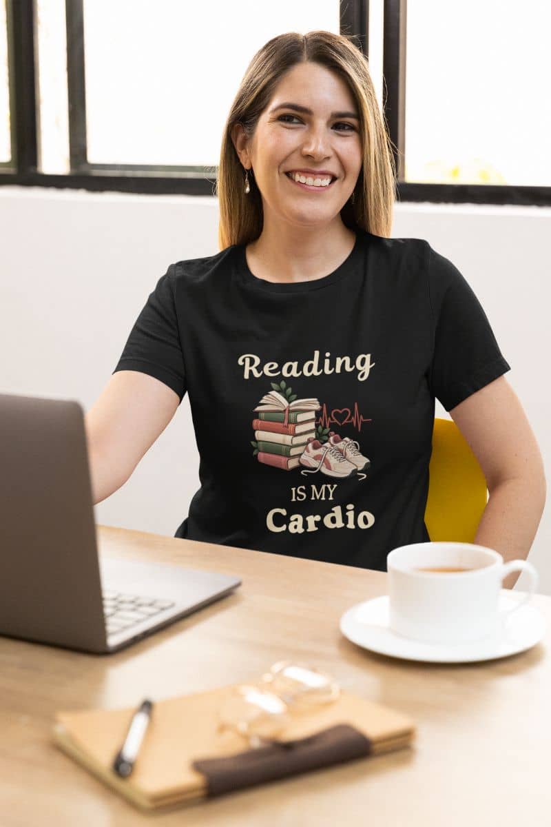 reading shirt with a woman wearing a black t-shirt that says 'Reading is my Cardio'