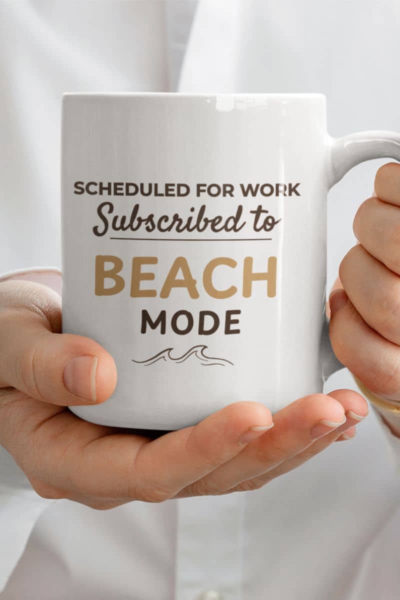 summer coffee mug with a person holding a mug with text 'Scheduled for work, subscribed to beach mode'.
