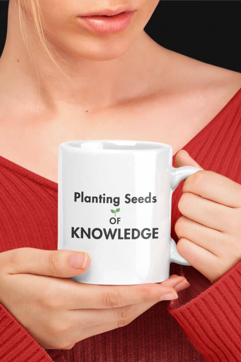 teacher appreciation gift with a person holding a white ceramic mug with the printed phrase 'Planting Seeds of KNOWLEDGE' 
