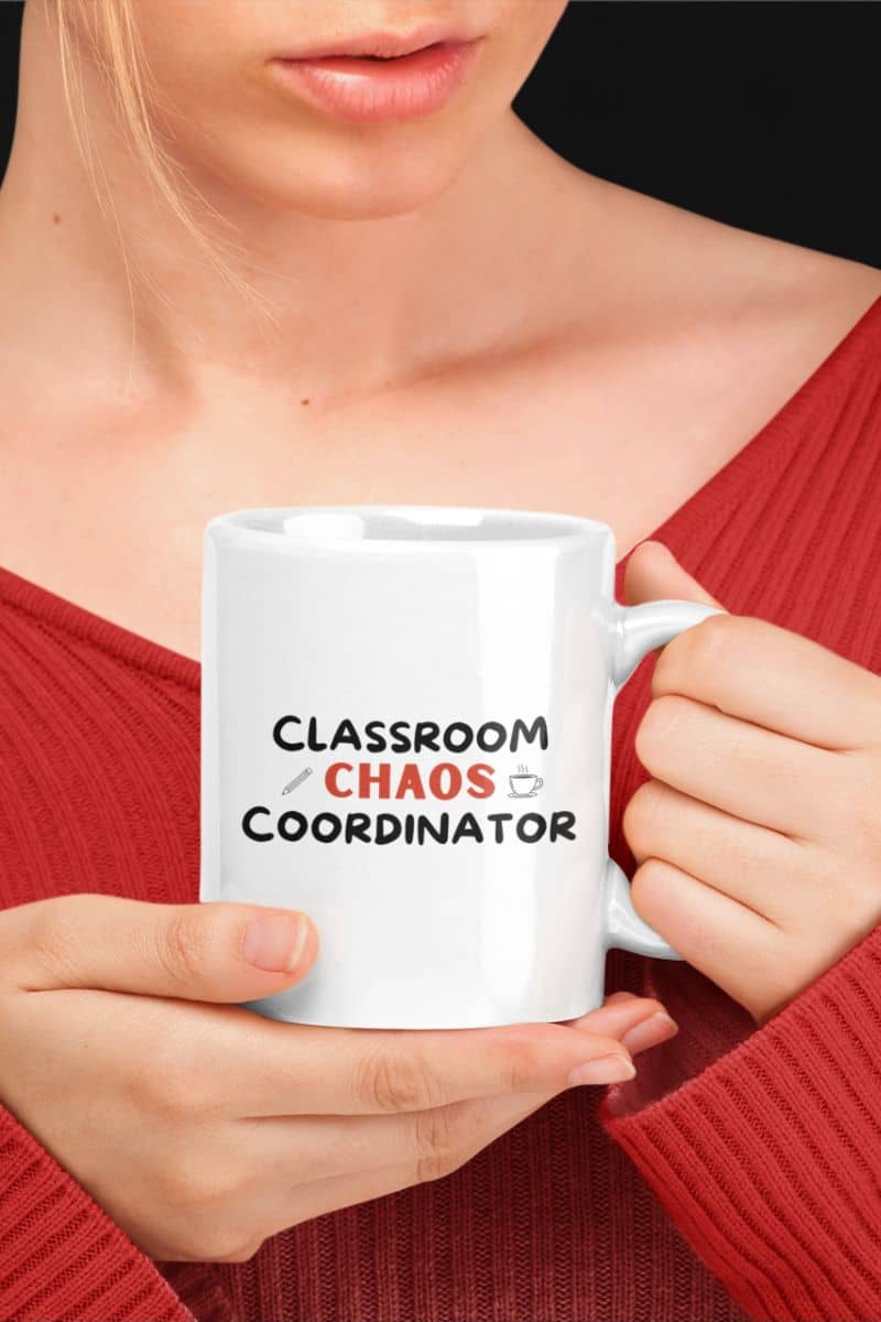 teacher appreciation mug with a person holding a white mug with text 'Classroom Chaos Coordinator'