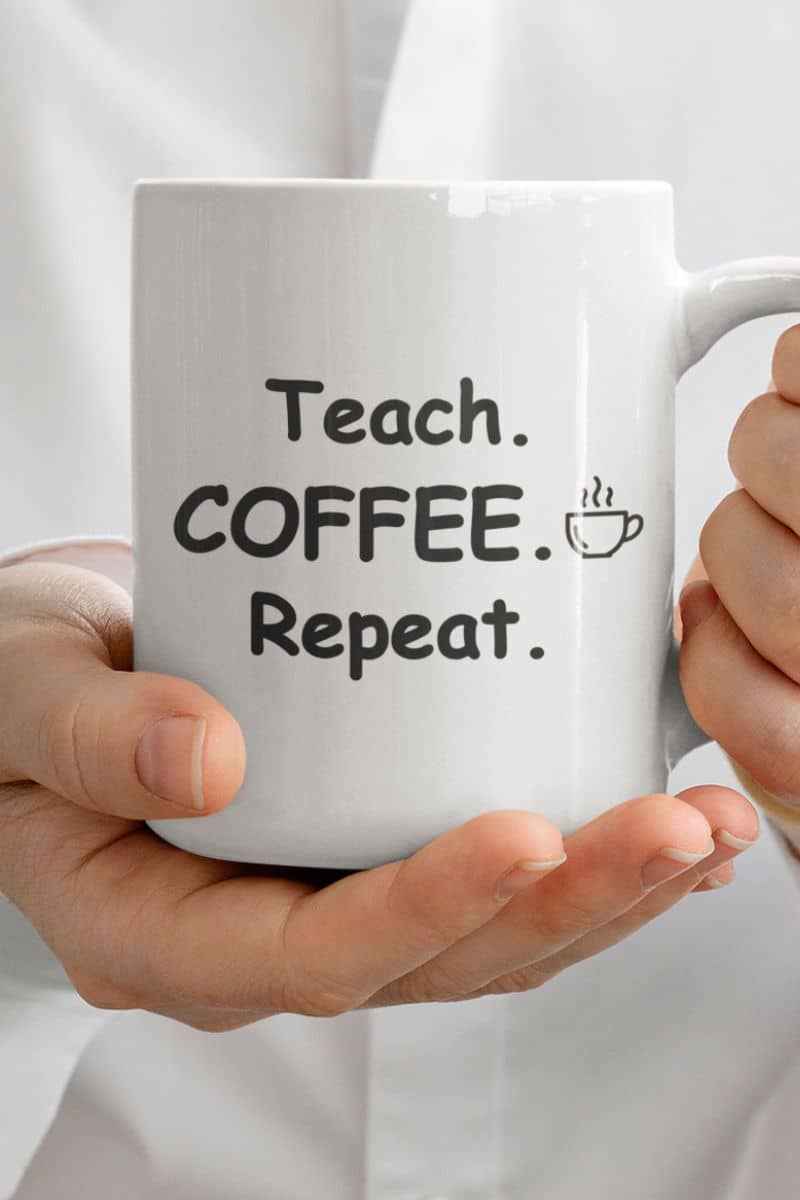 teacher desk mug with a white ceramic mug featuring the text 'Teach. Coffee. Repeat.'