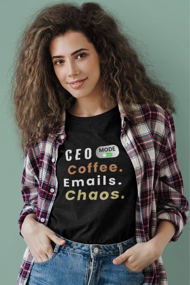 work humor t-shirt with a curly hair girl wearing a t-shirt with text 'CEO Mode: Coffee. Emails. Chaos.'