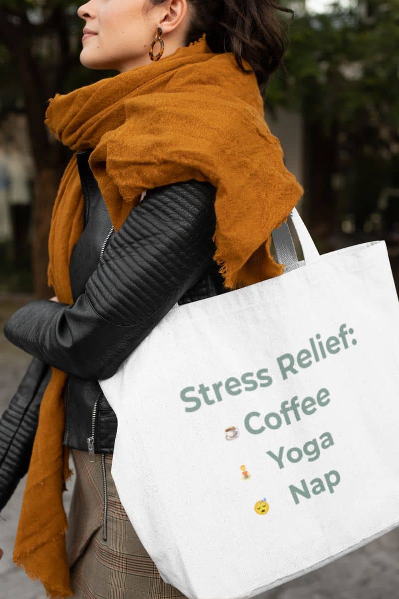 yoga and coffee tote with a person wearing a mustard yellow scarf and holding a tote bag with 'Stress Relief' text.